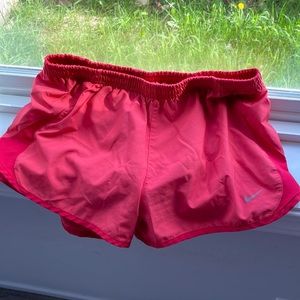 Nike women’s pink athletic shorts size m